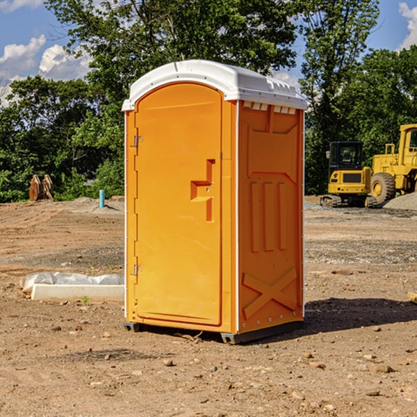 how often are the portable restrooms cleaned and serviced during a rental period in Long Barn